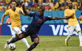 Netherlands' midfielder Georginio Wijnaldum scores during the third place play-off football match between Brazil and Netherlands.
