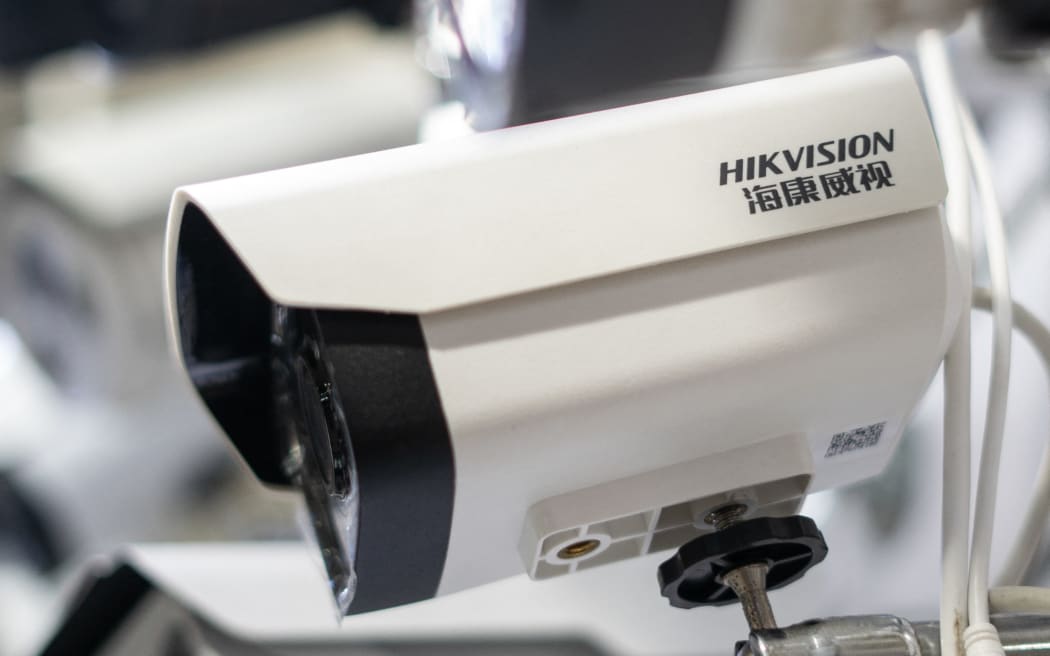 Picture of Hikvision cameras in an electronic mall in Beijing on May 24, 2019. - Shares in two top Chinese surveillance firms plunged on May 22 following reports Washington is considering banning them from buying US components, just as the blacklisting of telecoms giant Huawei fanned their escalating tech war. (Photo by FRED DUFOUR / AFP)