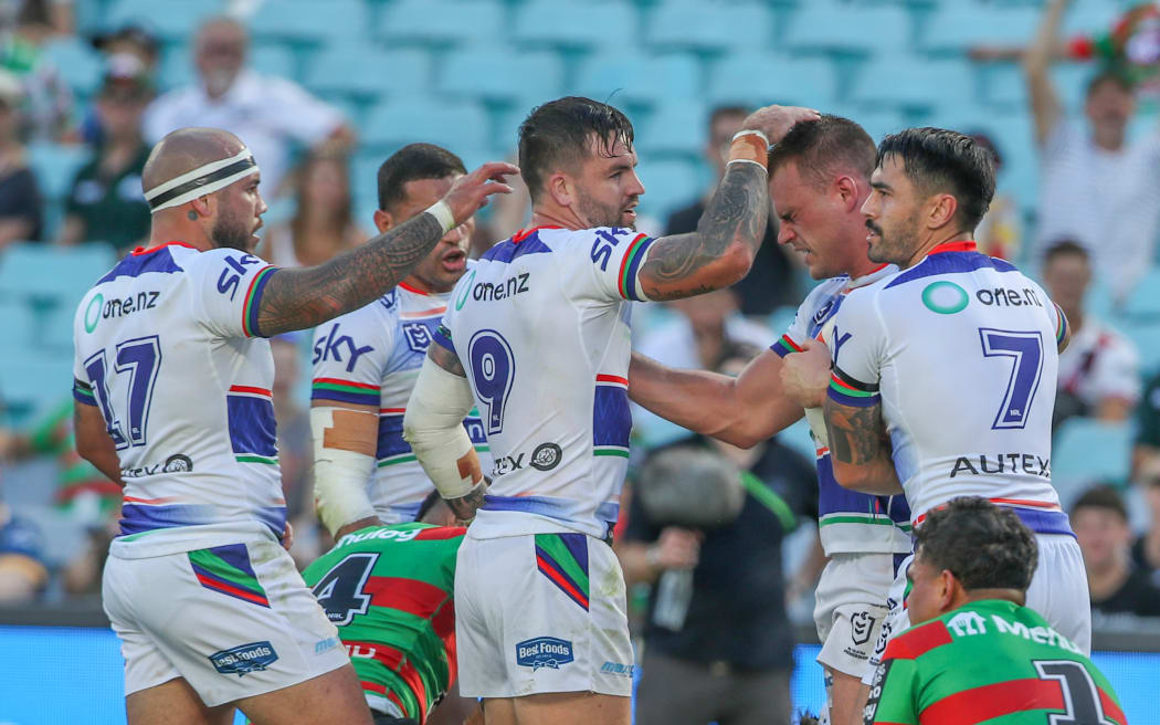 Jackson Ford of the Warriors celebrates with teammates after scoring  .South Sydney Rabbitohs v One NZ Warriors. NRL Rugby League, Accor Stadium., NSW, Australia, Saturday 6th April 2024 Copyright Photo: David Neilson / www.photosport.nz