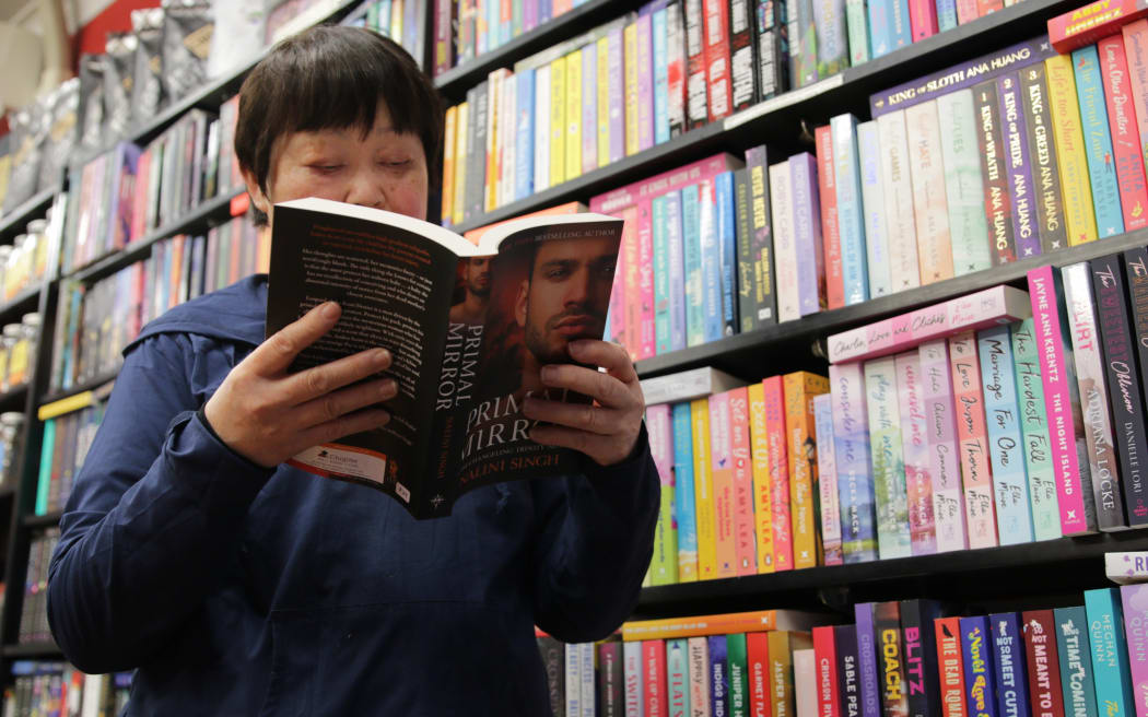 Frances Loo owns Chapter Book & Tea Shop in Mt Eden. She's seen a surge in Gen Z readers of romance novels.