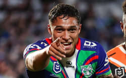 Te Maire Martin celebrates a try for the Warriors against Wests Tigers.