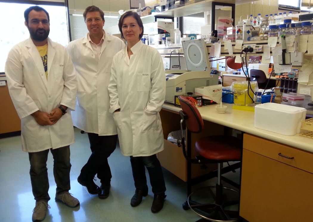 A photo from left to right of Jiffin Khosa, Richard Macknight and Robyn Lee in the lab