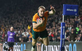 Australia’s Max Jorgensen scores the winning try against England at Twickenham.