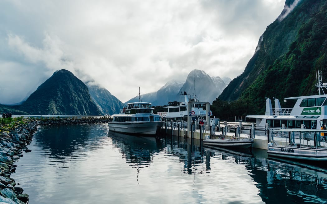 Boats moored at Milford Sound, Fiordland.