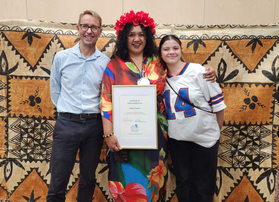 Maria Pasene, who was the coordinator for the Covid-19 response for Pacific communities in Christchurch, stands with former New Zealand Director-General of Health Sir Ashley Bloomfield and her daughter Oriana Pasene.