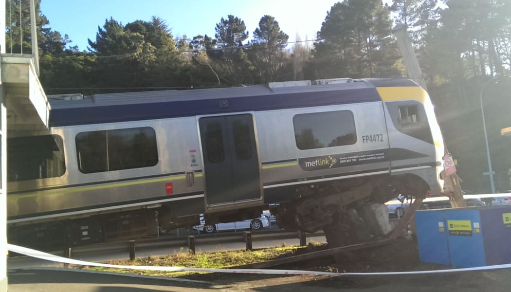 The train perched on the concrete buffer at Melling station.