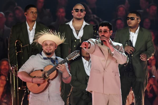 Puerto Rican rapper Bad Bunny (R) performs during his "Debi tirar mas fotos" world tour at the Atanasio Girardot Stadium in Medellin, Colombia, on January 23, 2026.