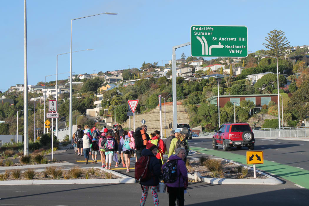 A photo of the group heading from Ferrymead towards the causeway across the estuary