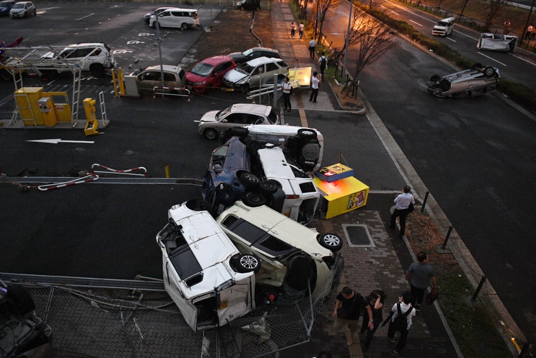 Vehicles are over-turned by strong wind due to the typhoon Jebi is pictured  in Osaka on Sep.4, 2018. Powerful typhoon made a landfall on Tokushima Prefecture in noon and expected to proceed to the Sea of Japan.
