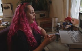 Movie still from the documentary Ms. Information showing the subject, Siouxsie Wiles.