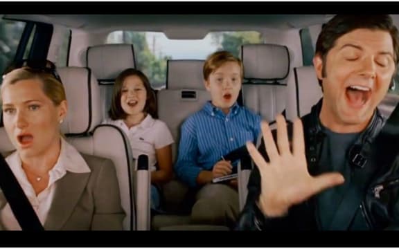 A family singing in the car from the movie Step Brothers