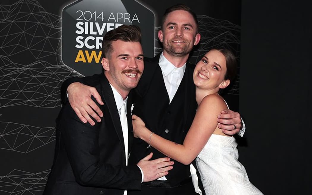 Caleb Nott, left, Joel Little and Georgia Nott of Broods pose at the 2014 Silver Scroll Awards.
