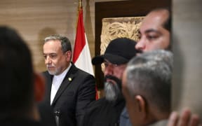 Iranian Foreign Minister Abbas Araqchi (C) addresses the media after he meets with Lebanon's Parliament Speaker Nabih Berri in Beirut, Lebanon, on January 9, 2026. (Photo by Fadel Itani / Middle East Images via AFP)