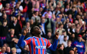 Crystal Palace's English striker Eddie Nketiah celebrates.