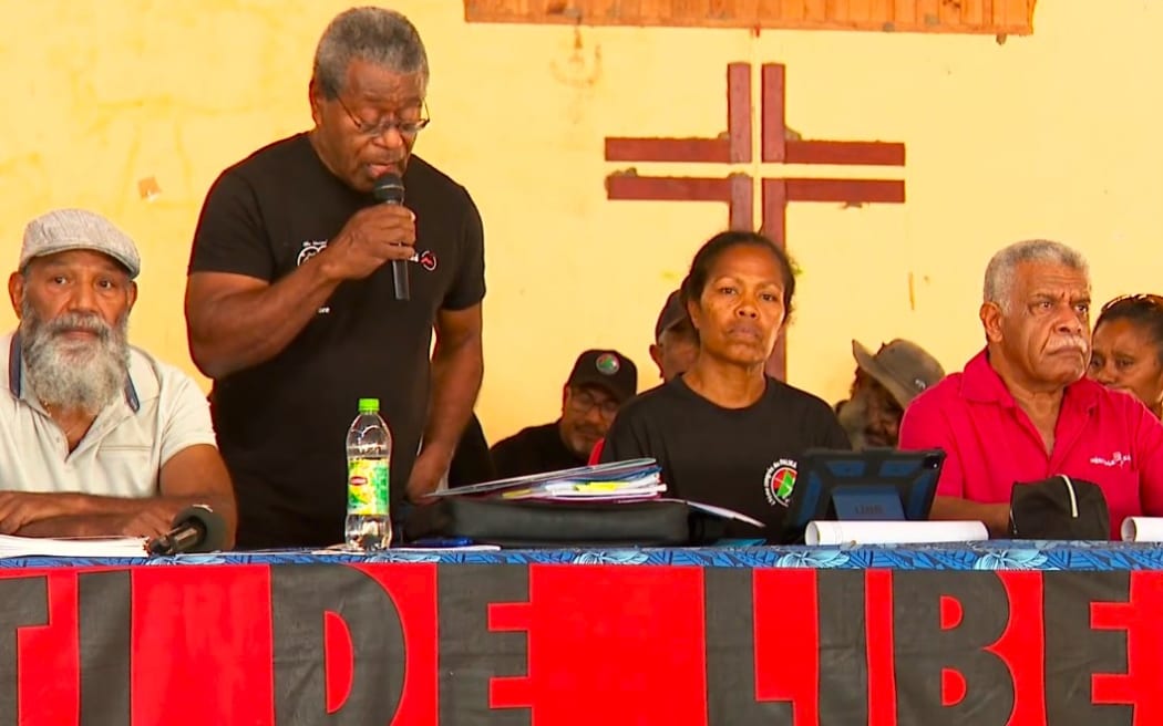 PALIKA spokesman Jean-Pierre Djaïwé delivers opening address at the party’s Congress in Païta, Kaala-Gomen as New Caledonia President Louis Mapou (right) listens. 9 November 2024.