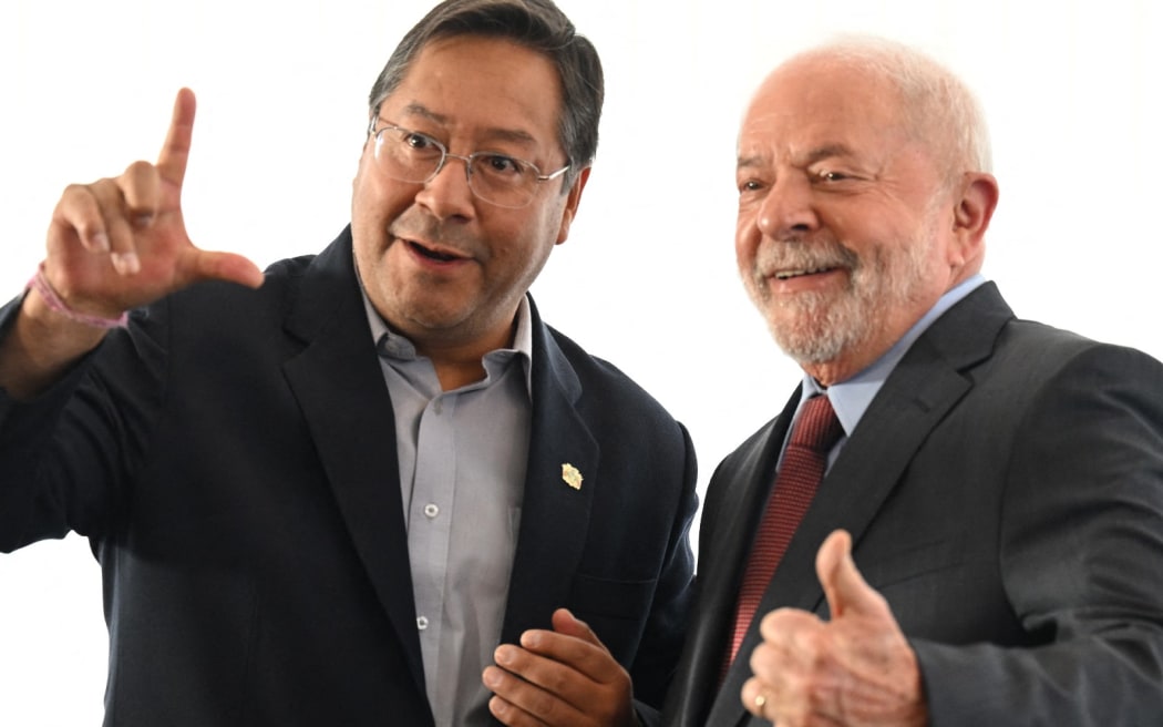 Brazil's President Luiz Inacio Lula da Silva (R) and his Bolivian counterpart Luis Arce.