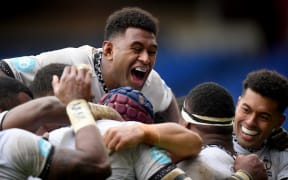 The Flying Fijians are all smiles after another try.