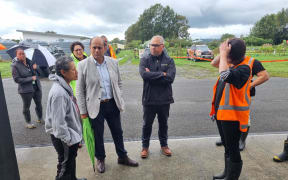 Willie Jackson and Peeni Henare meet whānau at Waipatu marae on 28 February, 2023.