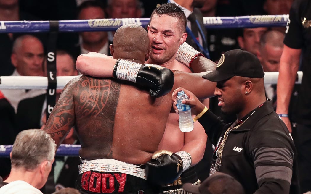 Joseph Parker congratulates Dillian Whyte on winning their heavyweight bout in London.