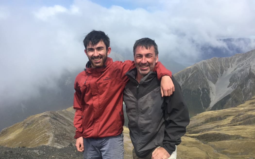 Labour MP Duncan Webb and his son Albert Webb on top of Avalanche Peak.