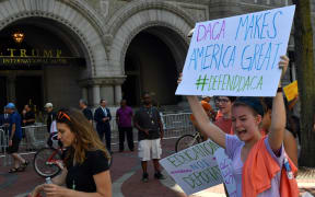 Immigrants and supporters demonstrating during a rally in support of the Deferred Action for Childhood Arrivals (DACA) program outside Trump International Hotel in Washington DC in September.