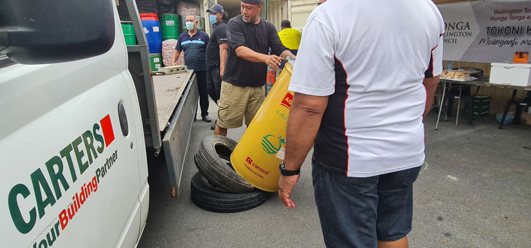 Each drum weighed over 100kgs as the men had no forklift to use - two tyres were were placed on the ground to take the impact of the drums when they were taken off a vehicle.