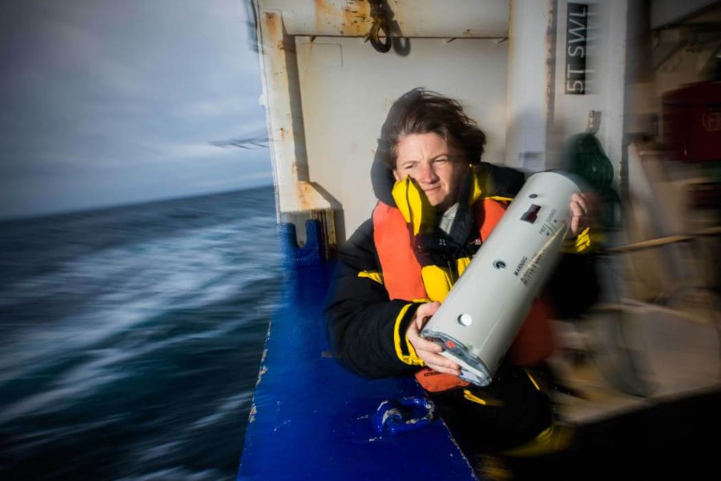 Susie Calderman from the Australian Antarctic Division deploys a sonobuoy to tune into the song of blue whales.