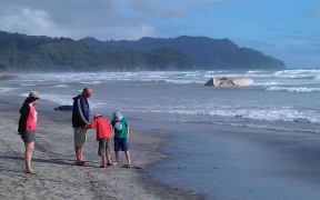 A container on Waihi Beach.