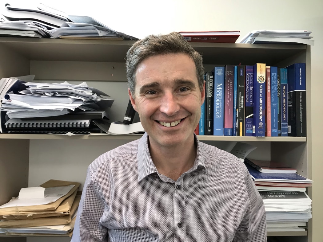 Clinical microbiologist & immunologist James Ussher in his office in the University of Otago.