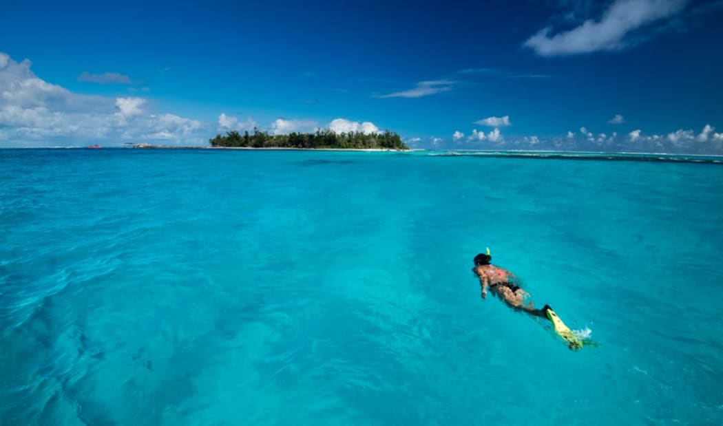 A snorkeler enjoys the waters of the CNMI.