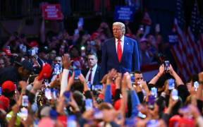 Former US President and Republican presidential candidate Donald Trump arrives to speak during a campaign rally at Madison Square Garden in New York, October 27, 2024. (Photo by ANGELA WEISS / AFP)