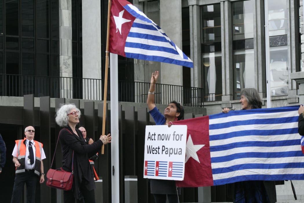 New Zealand MPs participate in a West Papua flag raising event in front of parliament.