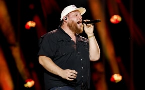 File photo: Luke Combs performs on stage during day one of CMA Fest 2023 at Nissan Stadium on June 08, 2023 in Nashville, Tennessee.
