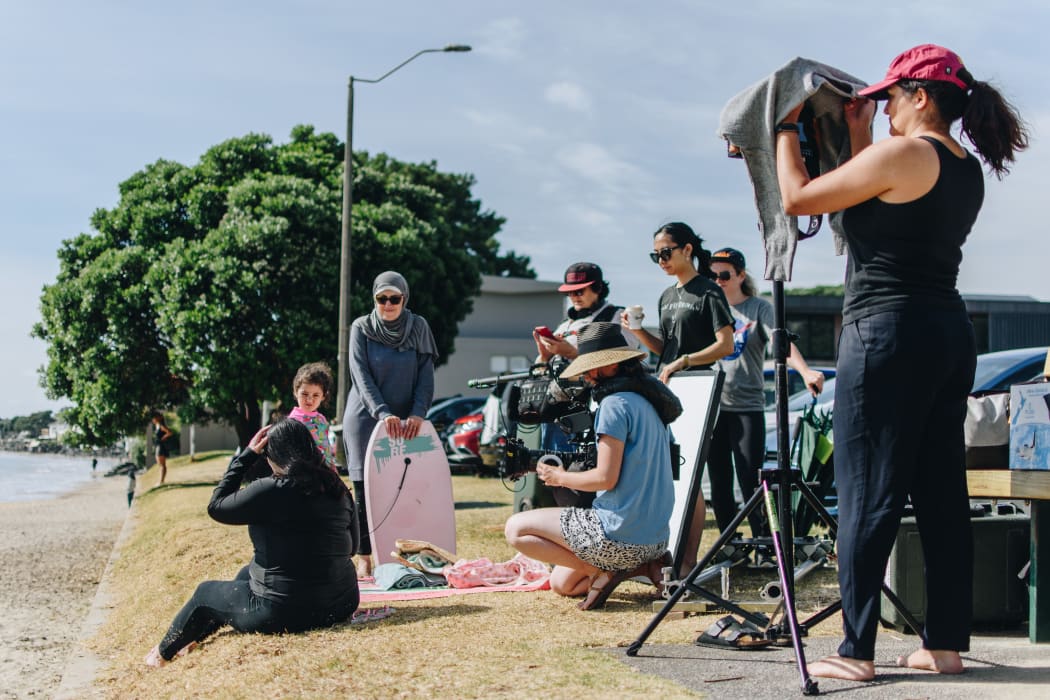 Fatima, Lara and Aliya with the entire crew filming Tima on Milford Beach.