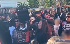 Members of the Mongrel Mob Barbarians gathered at Hillcrest Cemetery between Ōhope and Whakatāne to farewell their leader Steven Rota Taiatini on 14 June, 2023.
