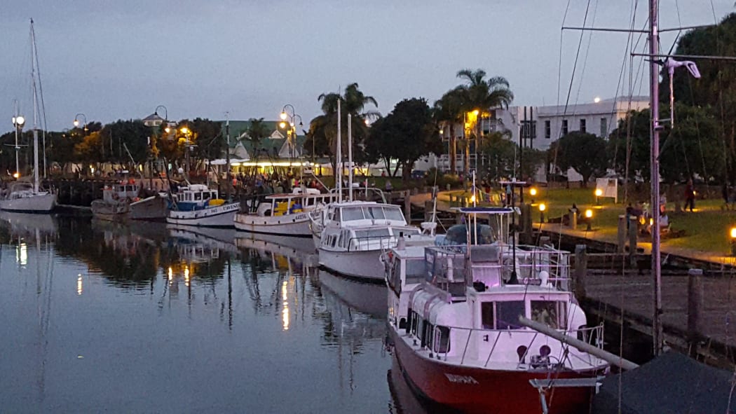 Marchers stream into Whangarei Town Basin's marina this evening after a mass walk around the Hatea Loop.