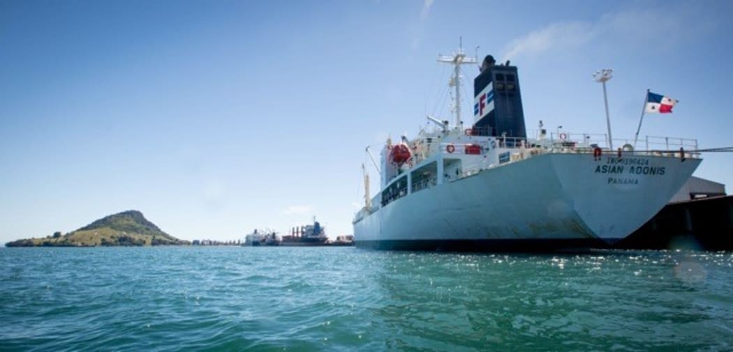 The Asian Adonis loading at the Port of Tauranga