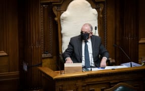 Speaker Trevor Mallard masked