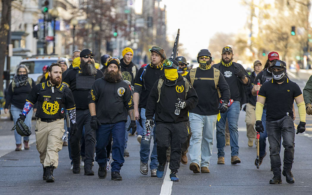 Members of the Proud Boys gather in support of President Donald Trump and in protest