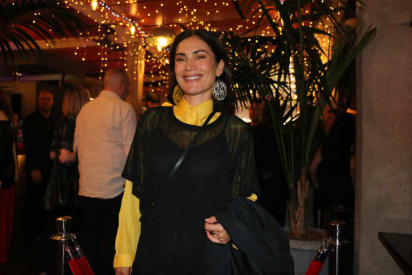 Anna Coddington wore a vintage silk shirt and Whakakai earrings.