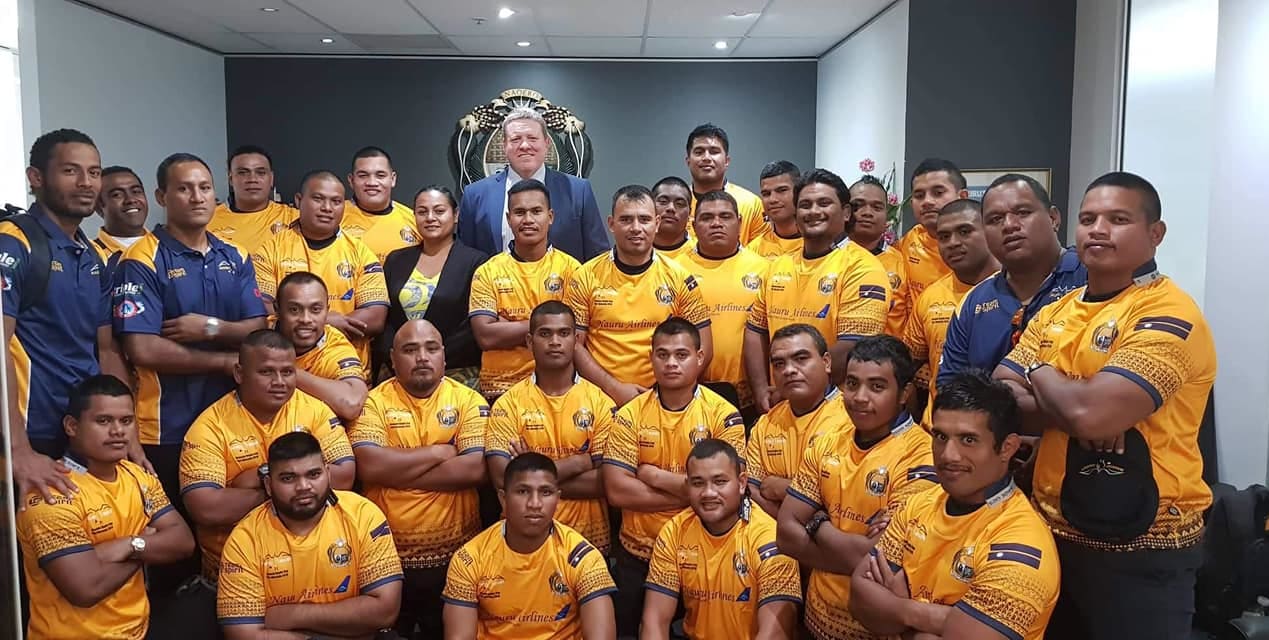 The Nauru Rugby team with their new kit presented by the vice president of the Queensland Rugby Union Garrick Morgan (Back row in suit) at the Nauru Consulate office in Brisbane. August 2019