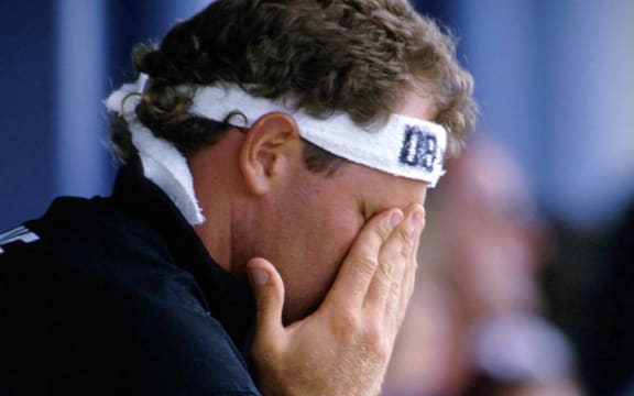 Black Caps captain Martin Crowe holds his head in his hands.