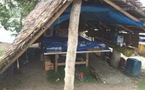 The 34 asylum seekers lived in a traditional hut on the docks of Yap after their boat sank
