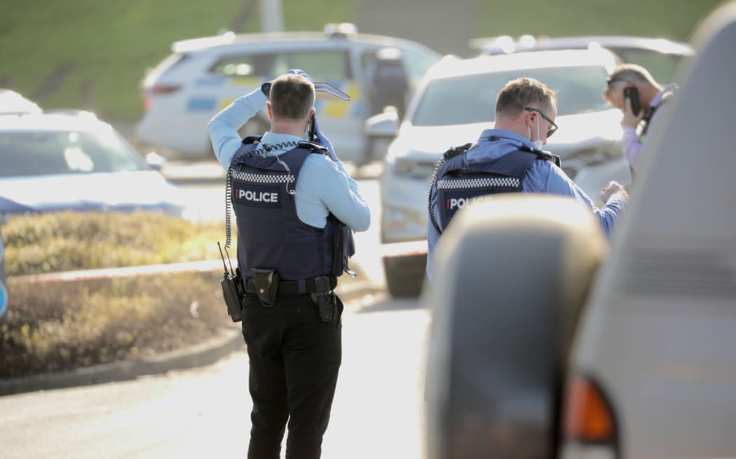 Police officers at the scene of an incident at Murrays Bay on the North Shore on 23 June 2022.