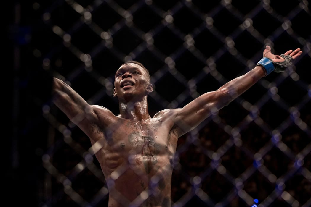 Israel Adesanya put his hands up after his win against Rob Wilkinson, Perth, Australia. 10 February 2018.