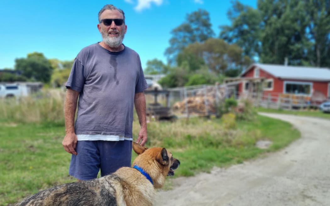 Hadi Gurton of Dehli Village says his dog Bella enjoys chasing the deer off the property.