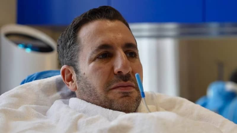 A close-up of Tristan Sternson in a treatment machine at his wellness facility.