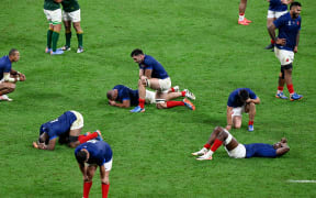 France players dejected after their loss to South Africa in their 2023 Rugby World Cup quarter-final.