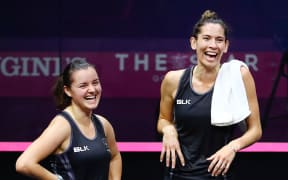 Joelle King and Amanda Landers-Murphy of New Zealand celebrate after winning Commonwealth Games gold.