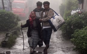 Residents in Kuta Tengah village, Karo, are among thousands who have fled the area after the eruption of the Sinabung volcano.